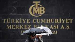 أوزاهين: تركيا قريبة من نهاية التشديد النقدي